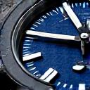 Close-up of a new limited edition diver's watch, with luminous dial markers and a rotating bezel